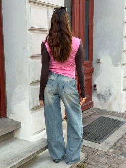 Alaia lavtaljede jeans med lyndetalje - Lys denim