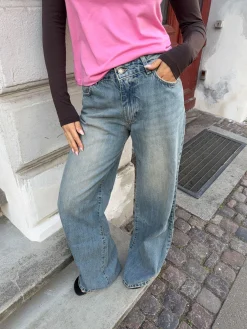 Alaia lavtaljede jeans med lyndetalje - Lys denim
