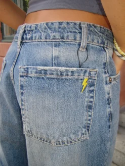 Alaia lavtaljede jeans med lyndetalje - Lys denim