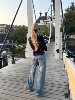 Alaia lavtaljede jeans med lyndetalje - Lys denim